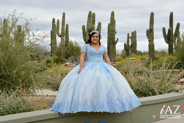 fotografia y video para una quinceañera con color de vestido azul cielo a la perfeccion con el paisaje de fondo